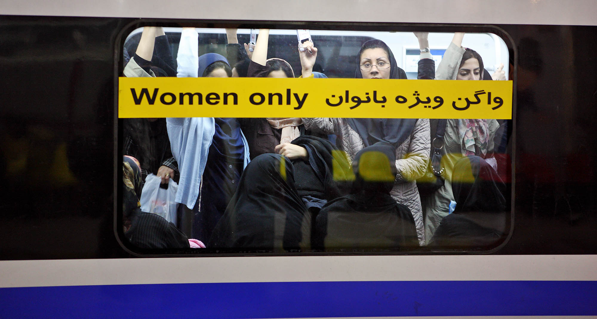 Underground station in Tehran Metro has separate compartments for women only (2007, Tehran, Iran). Editorial credit: Vladimir Melnik / Shutterstock.com