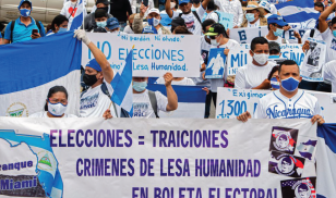 Nicaraguans living in Costa Rica demonstrate against the government of President Daniel Ortega in 2021. (Image Credit: EZEQUIEL BECERRA/AFP via Getty Images)